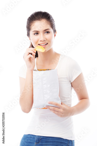 half asian woman eating snack on white background