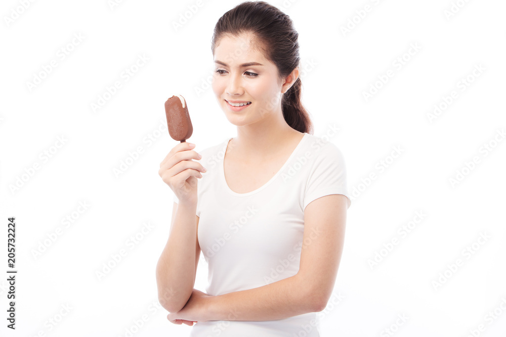 Beautiful asian girl eating or holding a ice cream on white background Beautiful asian girl eating or holding a ice cream on white background
