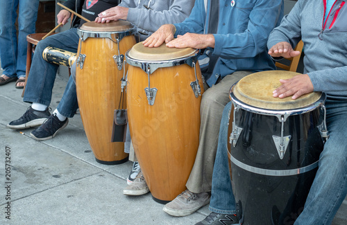 Mexican street artists playing drums during a performance
