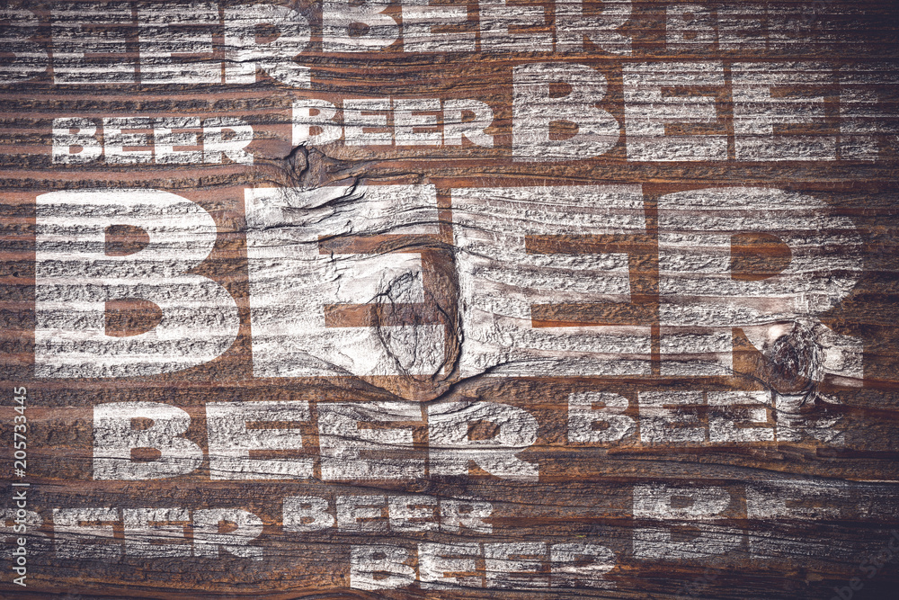 Beer menu on an old wooden plank
