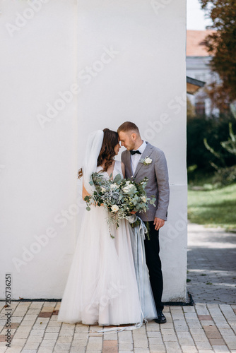 Fototapeta Portrait of a beautiful couple in love on your wedding day