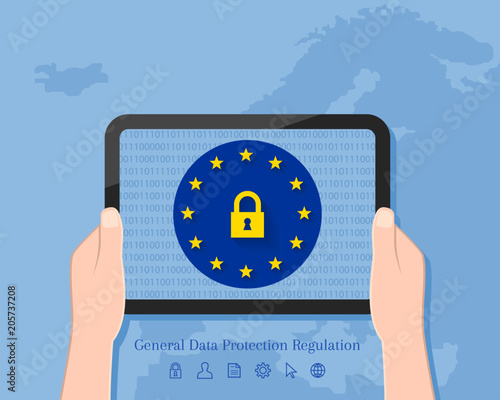 General Data Protection Regulation concept with map of Europe in the background. Hand holding tablet with lock symbol and EU flag on its screen display.