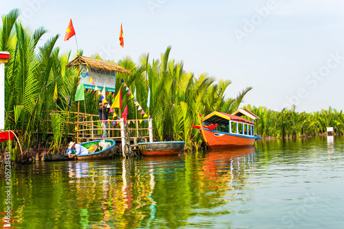 HOI AN, QUANG NAM, VIETNAM, April 26th, 2018: Tourists visit water coconut forest in Hoi An