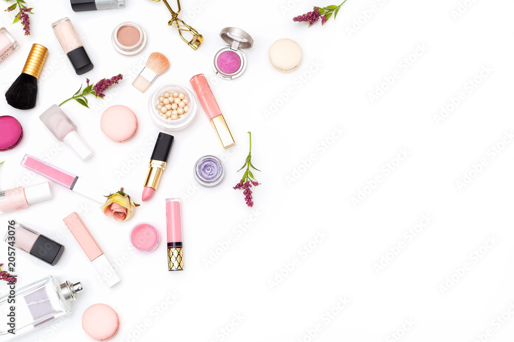 Set of pink decorative cosmetics on white background. Copy space