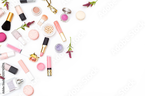 Set of pink decorative cosmetics on white background. Copy space