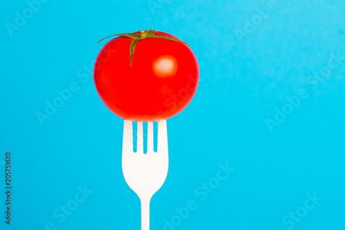 tomato fresh vegetable bright fork art background
