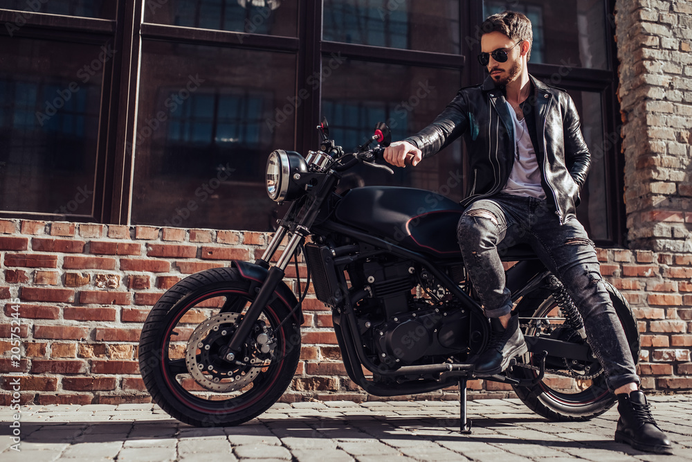 Biker with modern motorcycle Biker with modern motorcycle