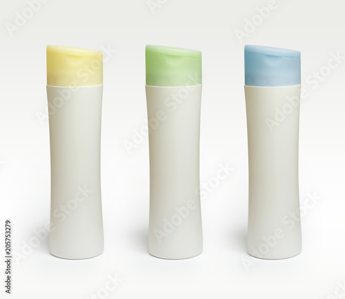 Long slim plastic bottles with colored caps.