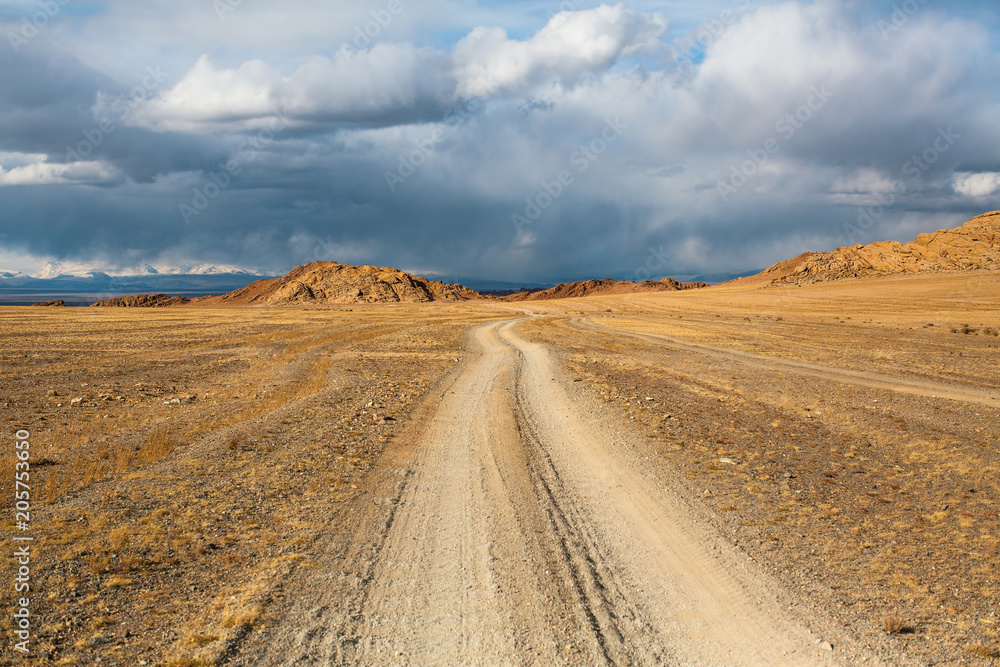 Road through the steppe and mountains of Western Mongolia.