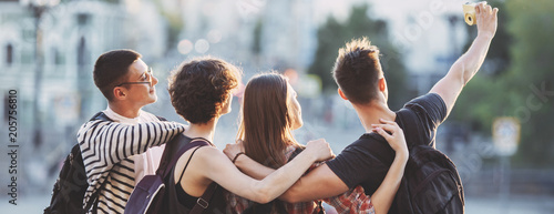 Friendship, togetherness, traveling, vacation, holidays, adventure sightseeing city tour Happy friends taking selfie together
