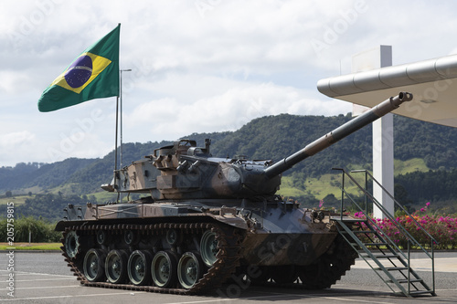 Brazilian battle tank, with the flag of Brazil, on display for people to know 