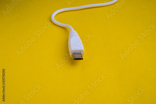 usb cable on yellow background