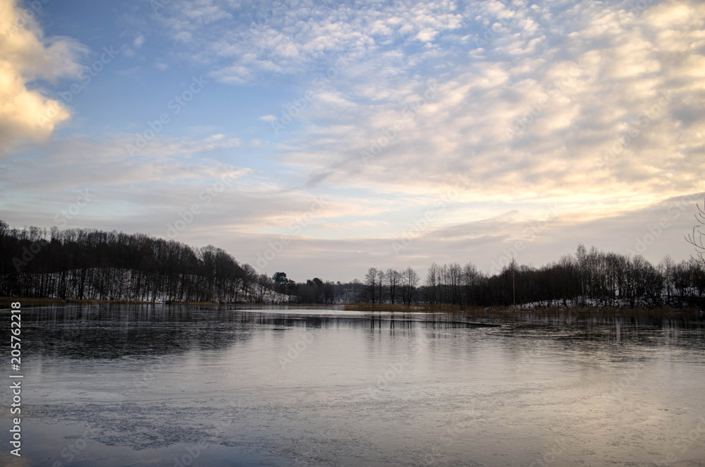 frozen lake in cloudy weather