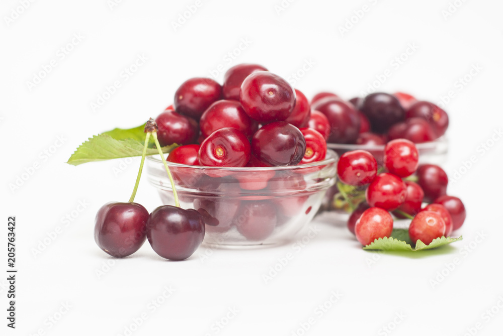 Cherries. Cherry. Cherries in color bowl and kitchen napkin. Red cherry. Fresh cherries. Cherry on white background. healthy food concept