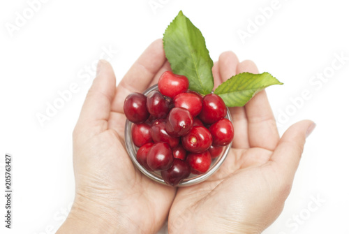 Cherries. Cherry. Cherries in glass bowl Hand Holding Red Cherry. Fresh cherries. Cherry on white background. healthy food concept