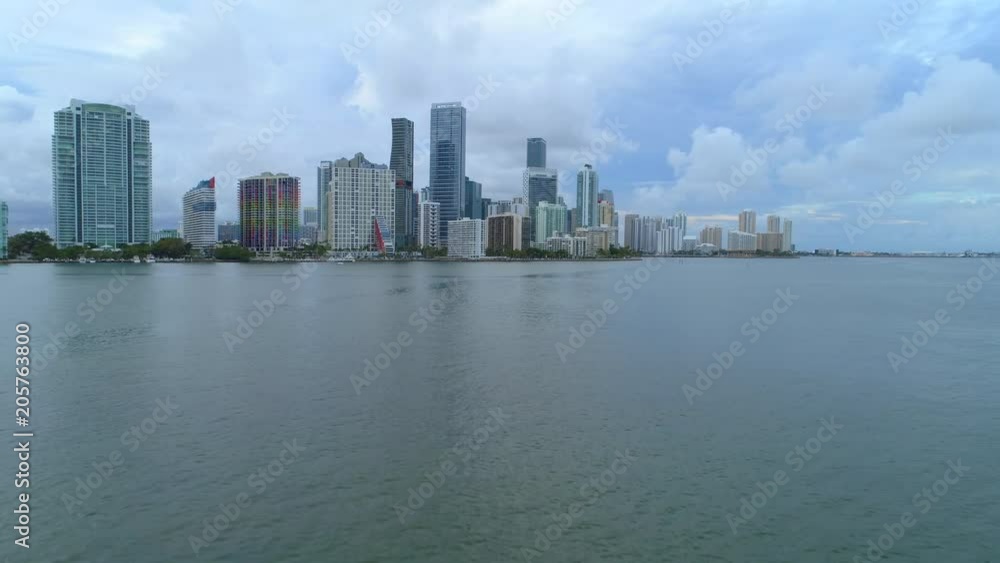 Aerial drone or boat approach to Brickell Miami city on bay Aerial drone or boat approach to Brickell Miami city on bay