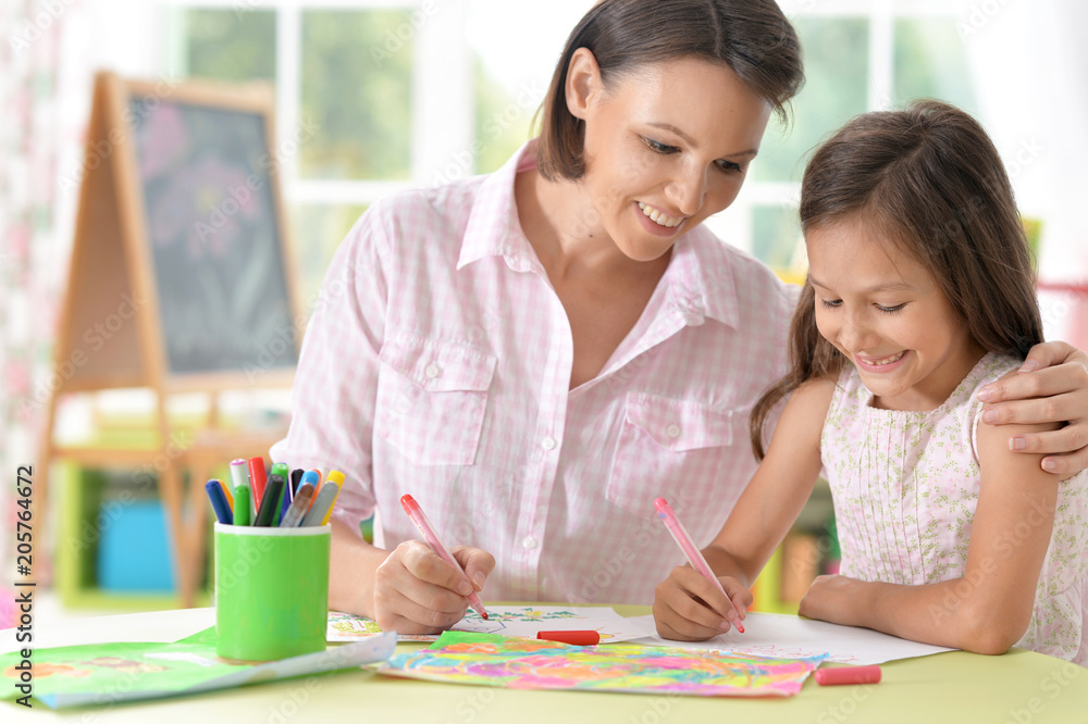 mother with little daughter drawing mother with little daughter drawing