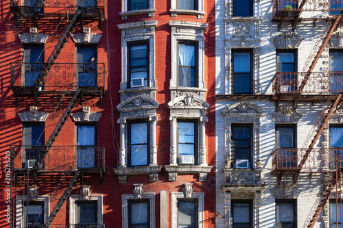 New York City style architecture background with windows and fire escapes