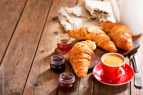 breakfast with croissants, coffee and jam