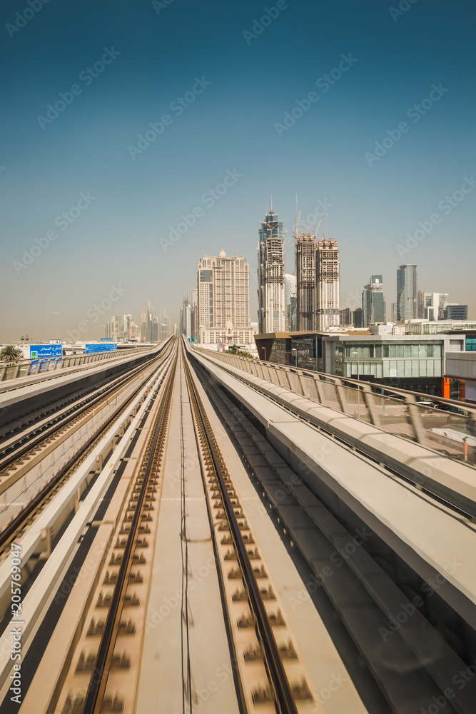 Railway and city buildings view in Dubai