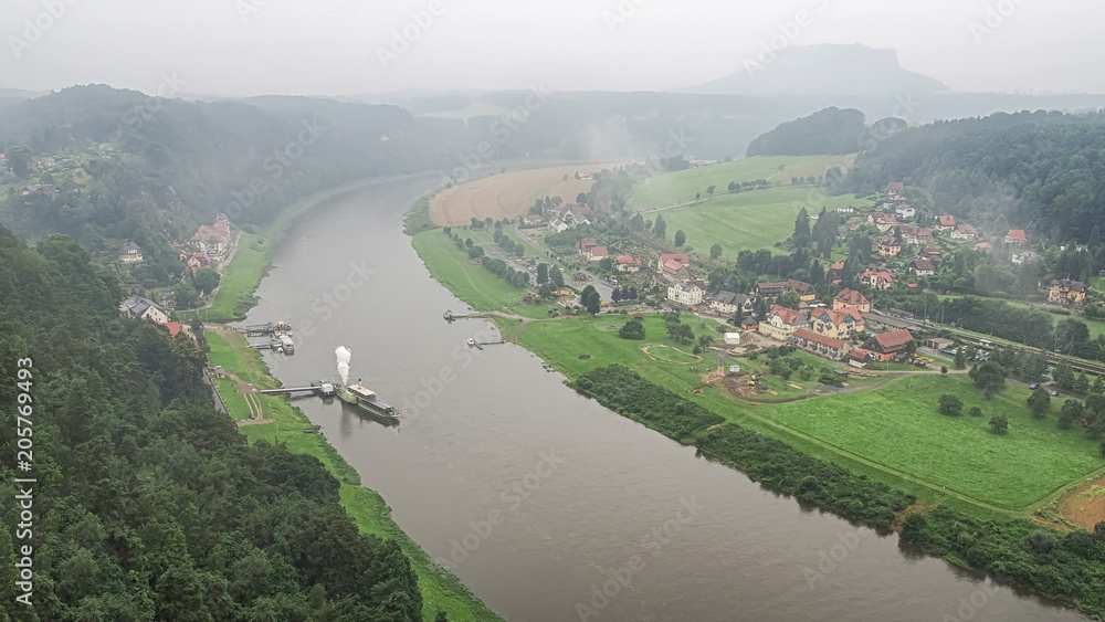 Aerial View of the Elbe near Rathen in Saxon Switzerland, Germany in cloudy foggy weather Aerial View of the Elbe near Rathen in Saxon Switzerland, Germany in cloudy foggy weather