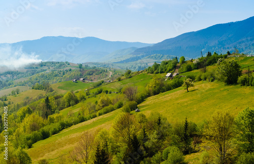 Fototapeta Naklejka Na Ścianę i Meble -  high mountains of the tatras, authentic rural house in the mountains against the background of wildlife,copy space, closeup