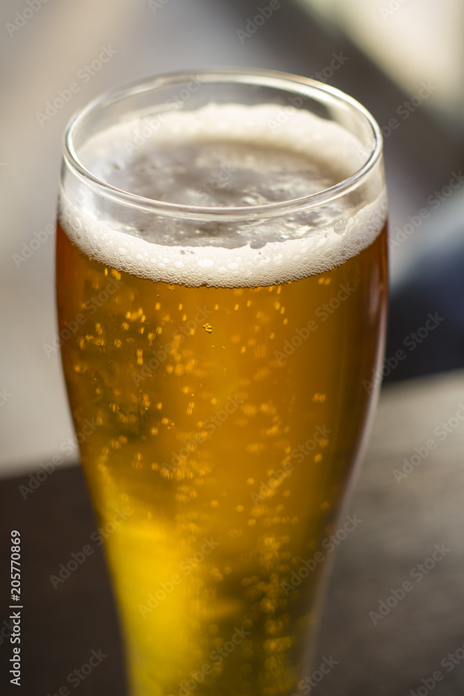 Gold color frosty beer Gold color frosty beer