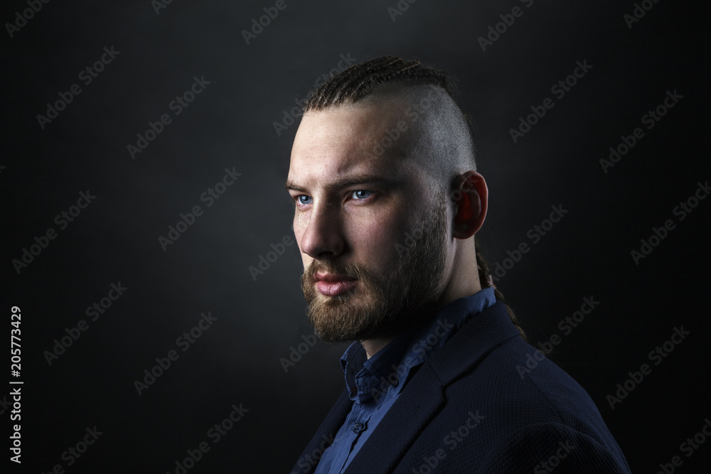 man with dreadlocks, looks like a viking, Iroquois haircut