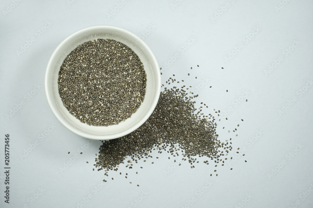 Chia seed, a healthy food on an isolated white background Chia seed, a healthy food on an isolated white background