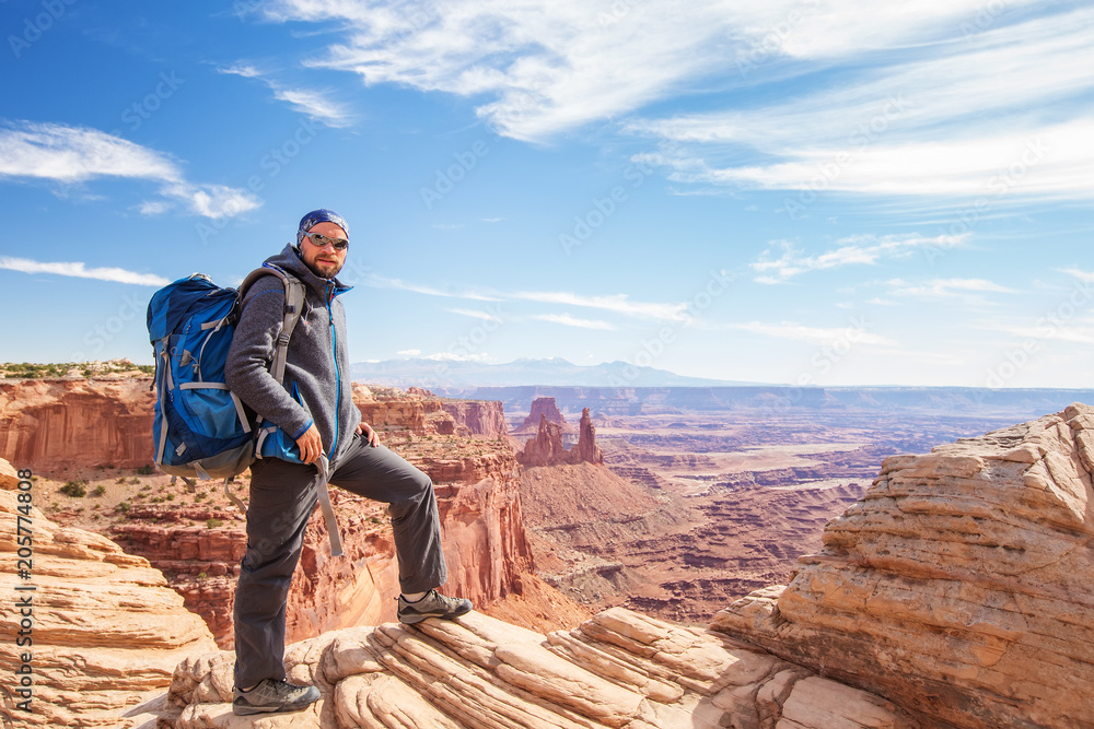 Hiker in Canyonlands National park in Utah, USA Hiker in Canyonlands National park in Utah, USA