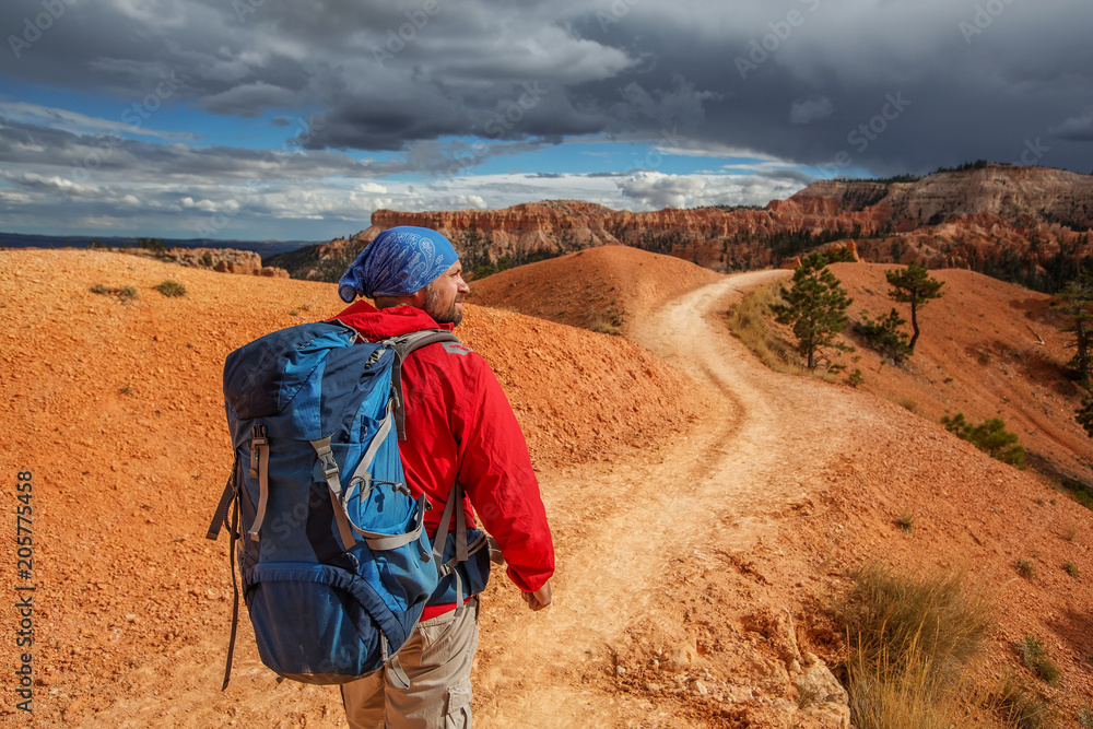 Hiker visits Bryce canyon National park in Utah, USA Hiker visits Bryce canyon National park in Utah, USA