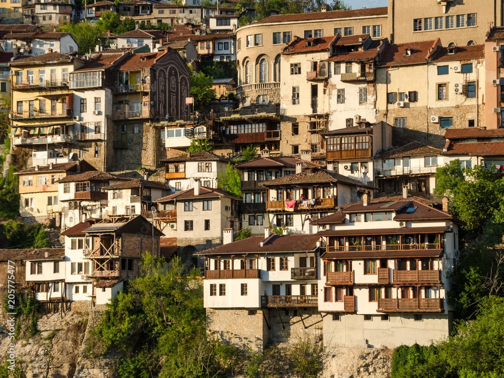 Scenic view at old town Veliko Tarnovo, old capital of Bulgaria. Traditional bulgarian architecture. Lovely spring morning.