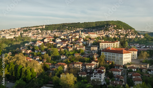 Scenic view at old town Veliko Tarnovo, old capital of Bulgaria. Traditional bulgarian architecture. Lovely spring morning. © VITALII