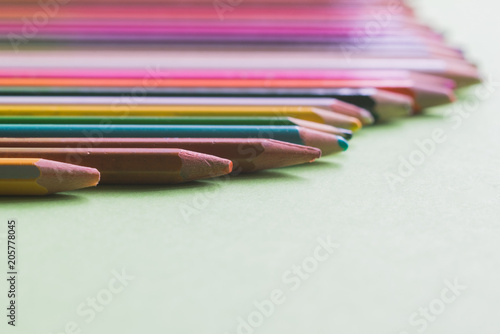close-up of very used colored pencils of different colors