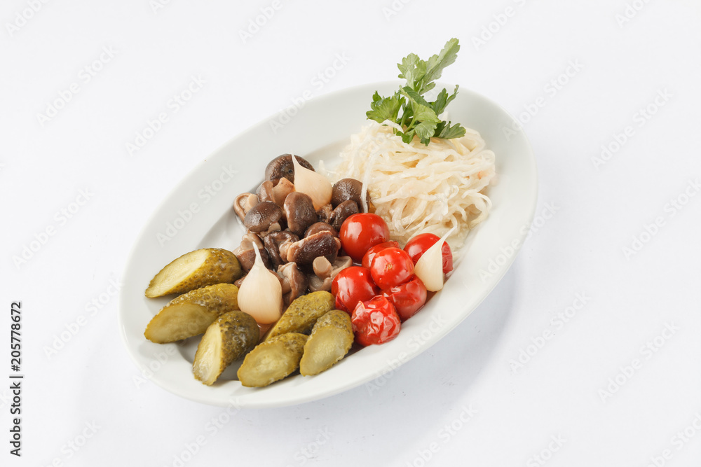 Pickled vegetables on white plate Pickled vegetables on white plate