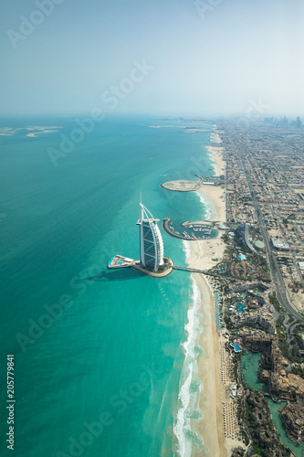Aerial view of Dubai coast line on a beautiful sunny day.