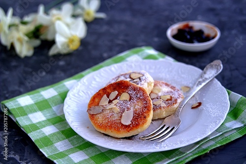 Wallpaper Mural Breakfast. Curd cheese cakes with plum jam, sprinkled with powdered sugar and almonds. Torontodigital.ca