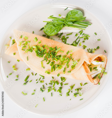 Pancake with brie cheese and chives