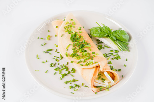 Pancake with brie cheese and chives