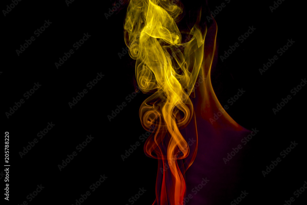 Obraz premium Colored smoke on black background
