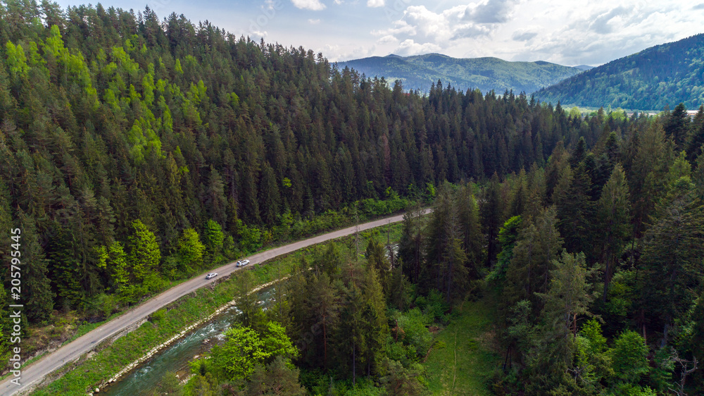 Aerial view of mountain road in summer.
