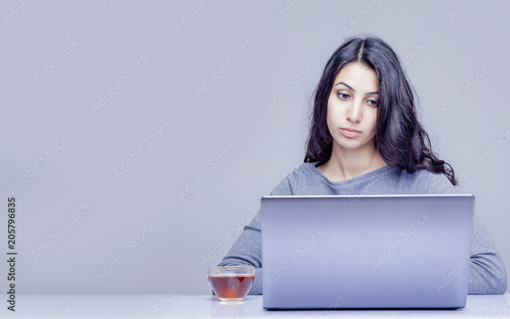 Young beautiful business woman working with laptop in office (Success, job, work, prospects concept) Young beautiful business woman working with laptop in office (Success, job, work, prospects concept)