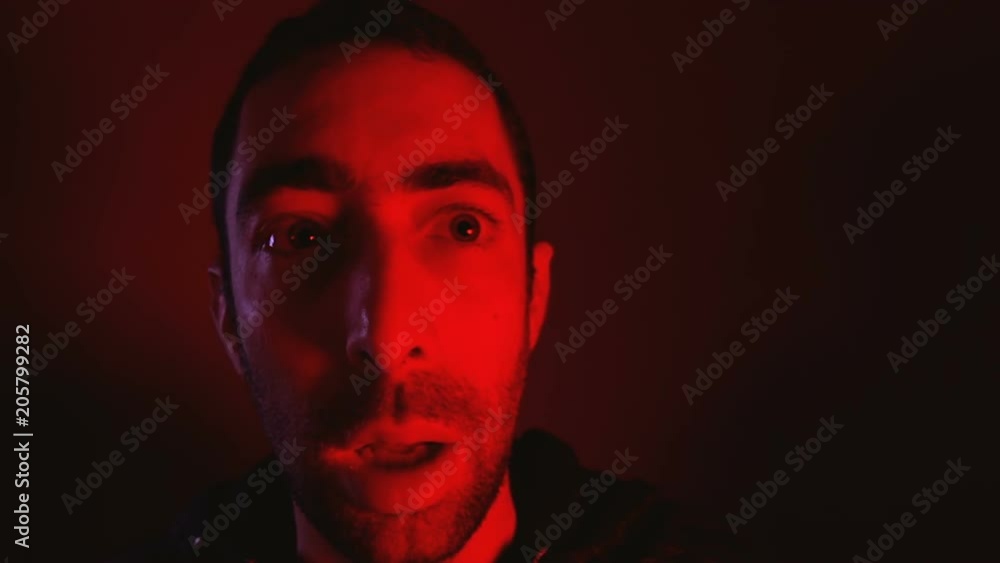 Man with surprised facial expression with opened mouth Man with surprised facial expression with opened mouth