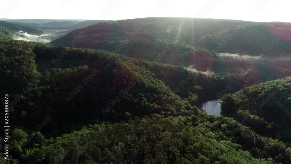 Epic aerial view of beautiful foggy morning river at sunrise. 4K 60FPS Epic aerial view of beautiful foggy morning river at sunrise. 4K 60FPS