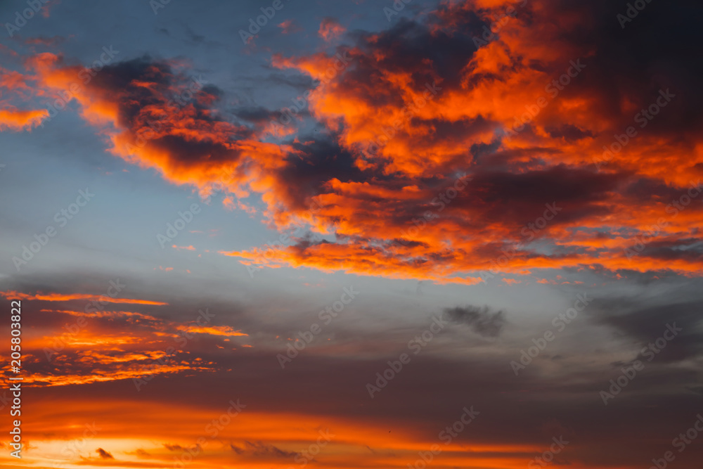 Fiery, orange and red colors sunset sky. Beautiful background