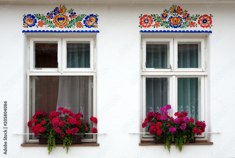 Window with flowers in the Straznice, eastern Moravia, Czech republic Window with flowers in the Straznice, eastern Moravia, Czech republic