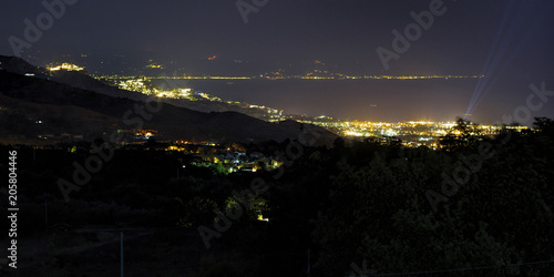 The pictures landscape of Sicily coast with Castelmola, Taormina and Giardini Naxos towns view in the background.Sicily, Italy photo