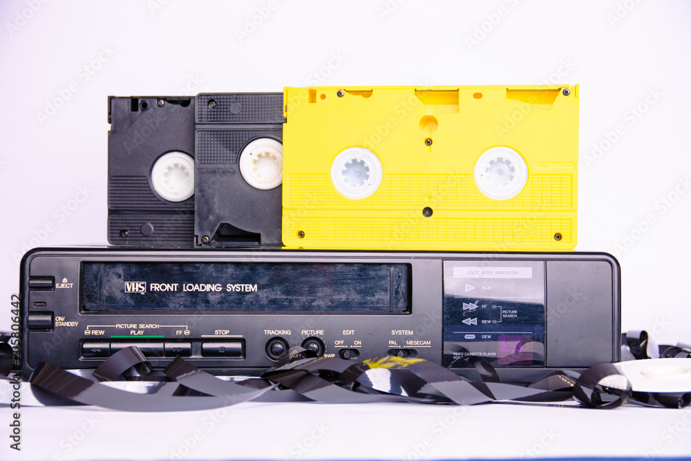 old vhs player wrapped a tape from a damaged cartridge StockFoto