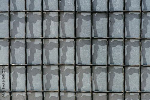 full frame image of metal cage covered wall background