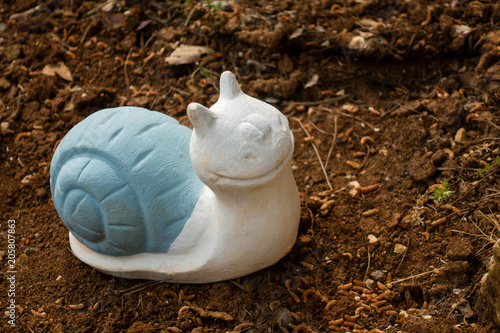 Fototapeta Naklejka Na Ścianę i Meble -  Snail garden gnome, figure
